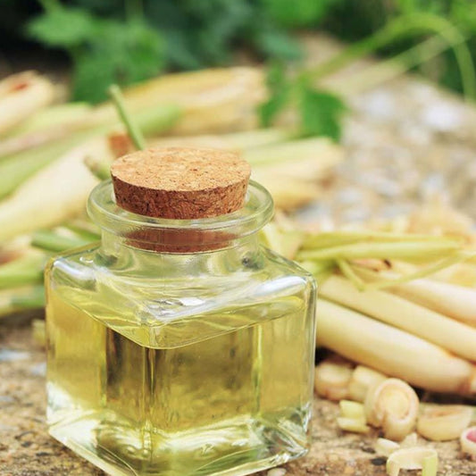Lemongrass essential oil in a glass bottle