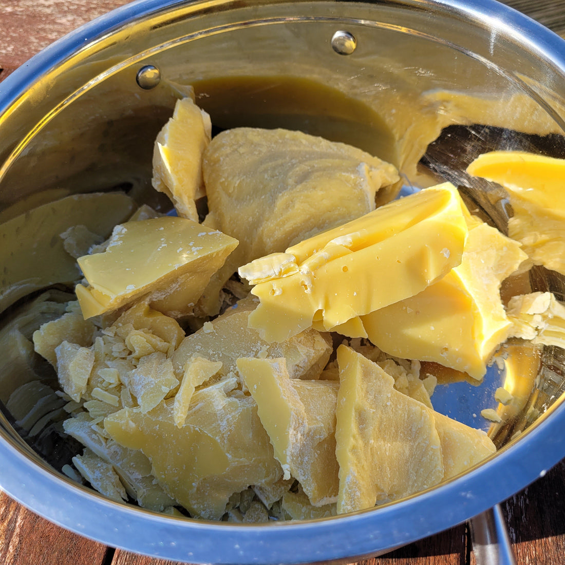 Cocoa Butter chunks in a large pan