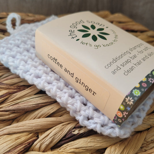 A Good Soap Bar on a hand crocheted soap saver bag