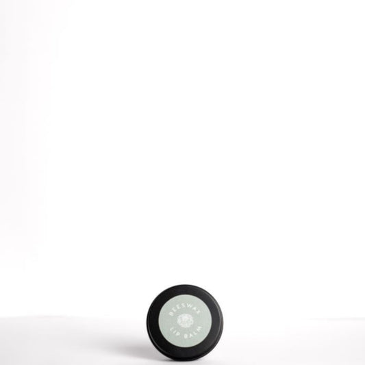 Laundry Garden Beeswax Lip Balm on a white background