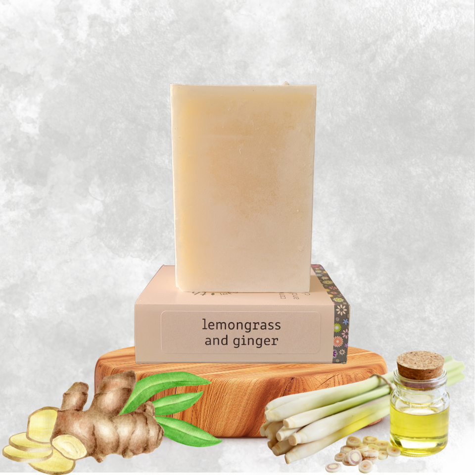 Lemongrass and Ginger Soap on a wooden base with Ginger and Lemongrass ingredients