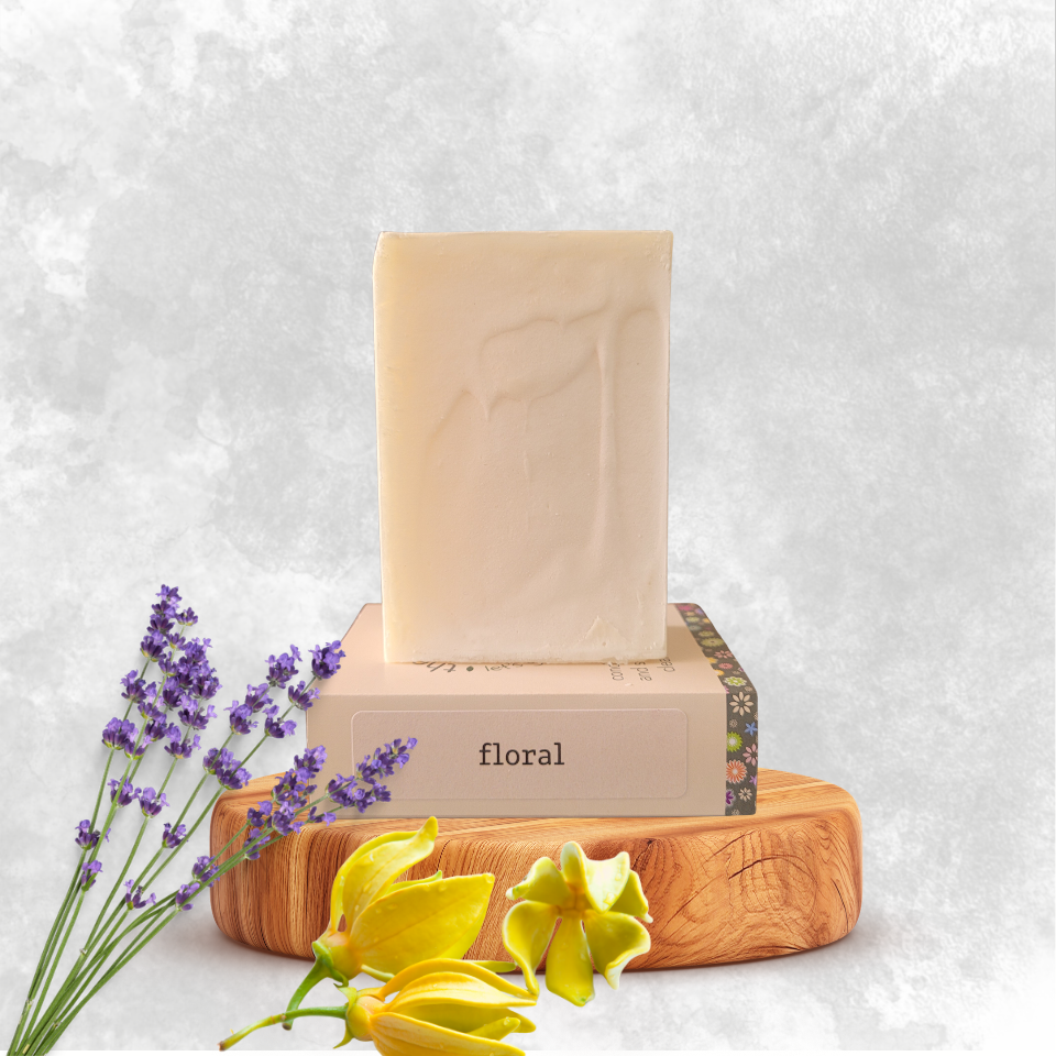 Floral scented soap bar on a wooden base with flower decorations