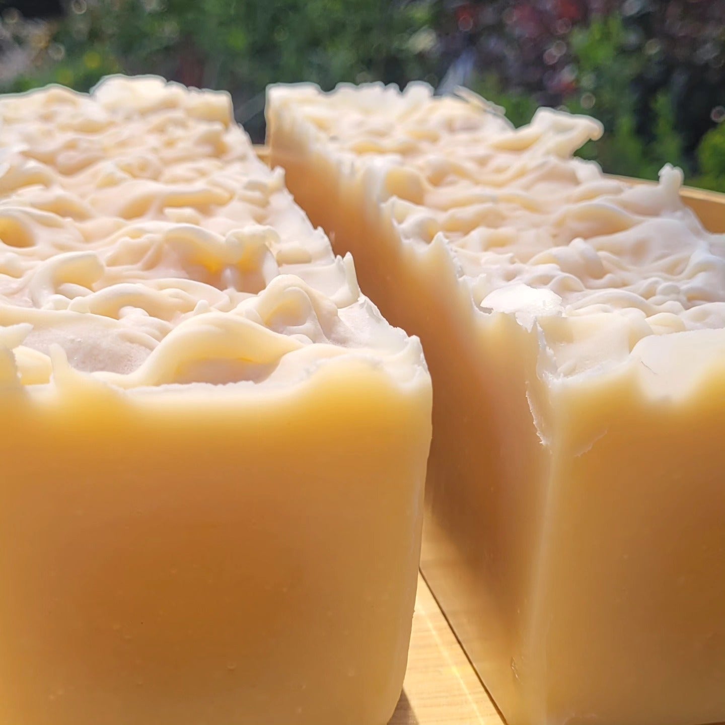 Blocks of creamy Good Soap shea butter and goat milk soaps ready for cutting