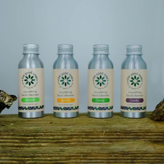 Set of 4 natural facial cleansing oils from The Good Soap. Aluminium bottles containing avocado cleanser, apricot cleanser, hemp cleanser and jojoba cleanser.
