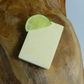 Patchouli and Lime Solid Deodorant Bar on a wooden background