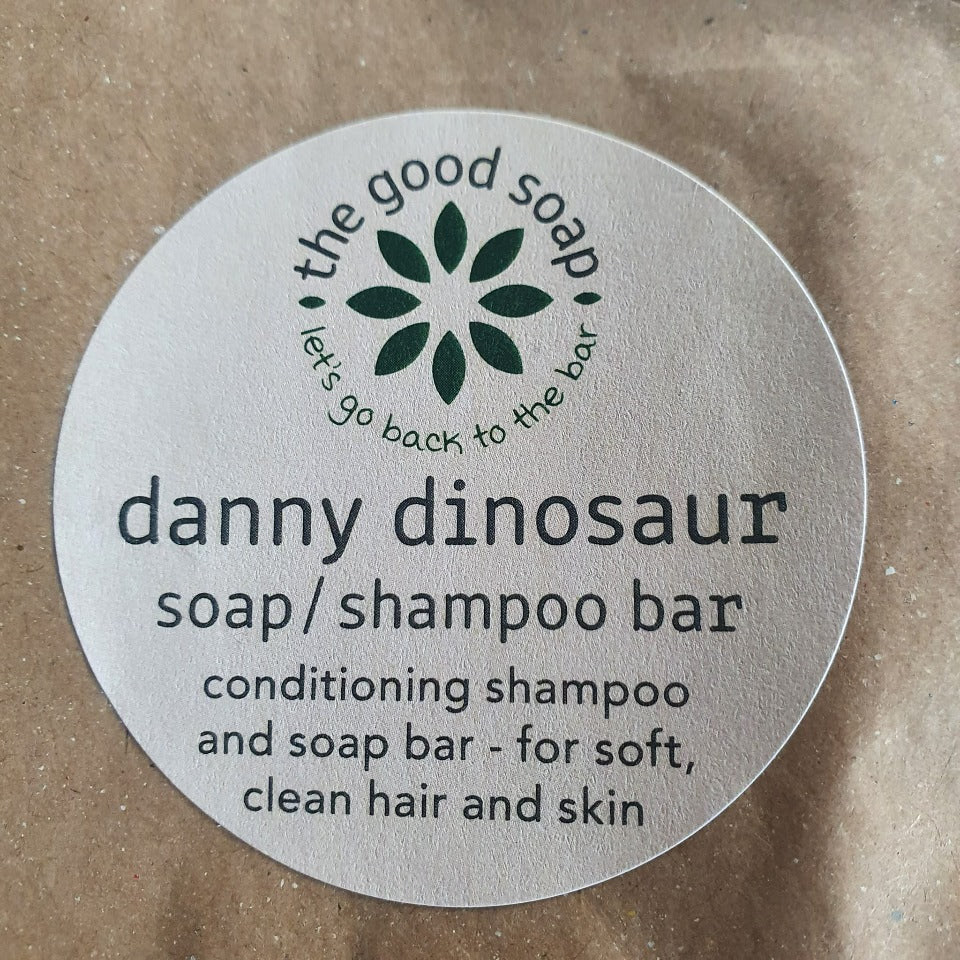 The Good Soap Danny dinosaur comes wrapped in a paper bag with a paper label